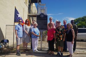 Williams Building historic marker ceremony participants: Jake Mangum and Dreanna Belden with the UNT Library System, David Holubec, Marker Chairman of MCHC, Ona Lea Pierce, Chairman, MCHC, Nate McDonald, County Judge Matagorda County, Donna Christensen, Glen Smith, Mayor of Palacios, David Kocurek, City Manager of Palacios, Barbara Reece, District Director for State Representative Cindy Burkett, District 113 and Eric Young, Pastor of Agape Family Outreach Church.